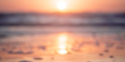 reflection of sunset on beachshore