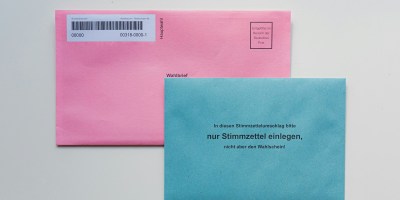 blue envelope on white table